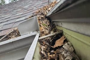 Signs of Clogged Gutters and How to Fix It
