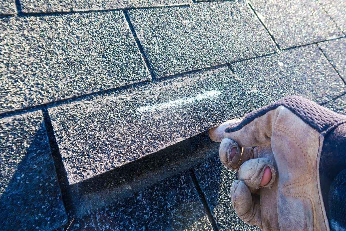 Identifying and Repairing Wind Damage to Shingles During Storm Season