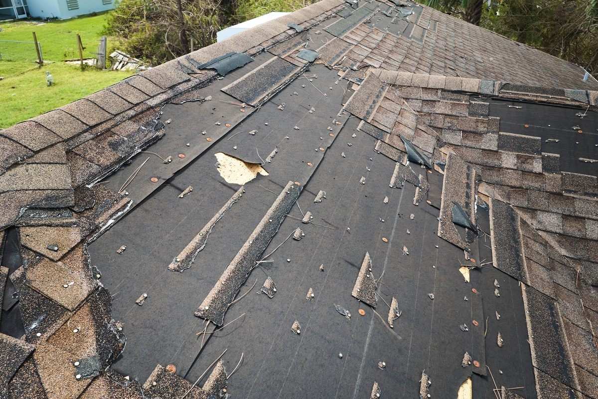 Identifying and Repairing Wind Damage to Shingles During Storm Season