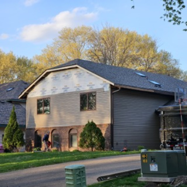 Completed exterior of the Blaine home after full structural restoration
