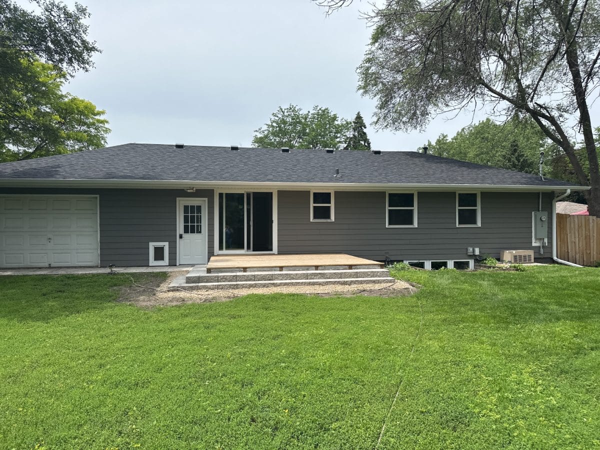 Dark gray ranch, back exterior