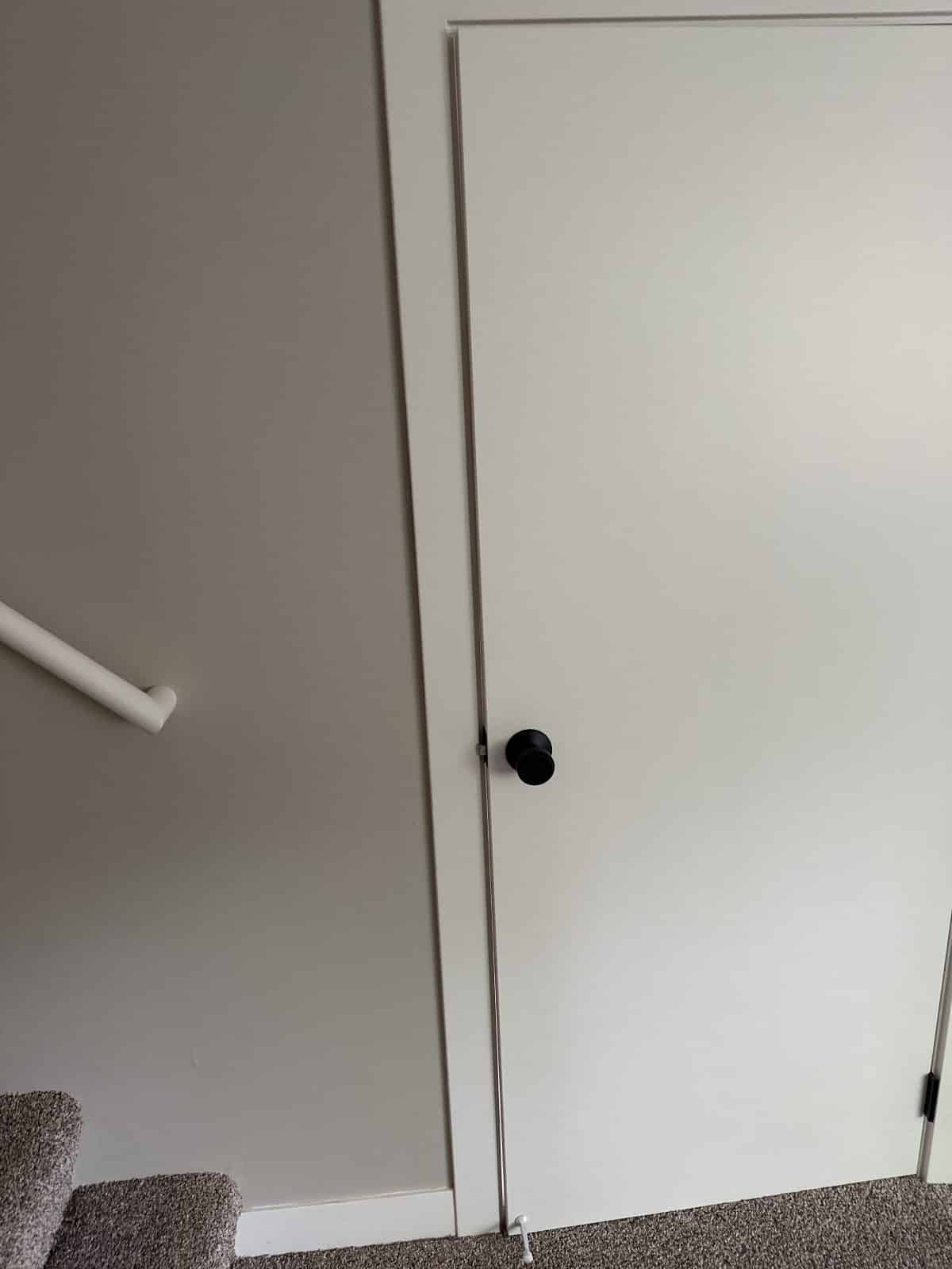 Interior, plain wall and door edge